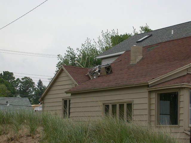 Air conditioner blown and antenna